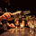 Hand pouring whiskey into glasses at Gibney's bar in Shoreditch